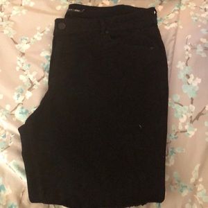 Black mesh knee skinny jeans